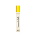 Perfume bottle labeled 'Summer in Sicily' with a gold cap on a light gray background