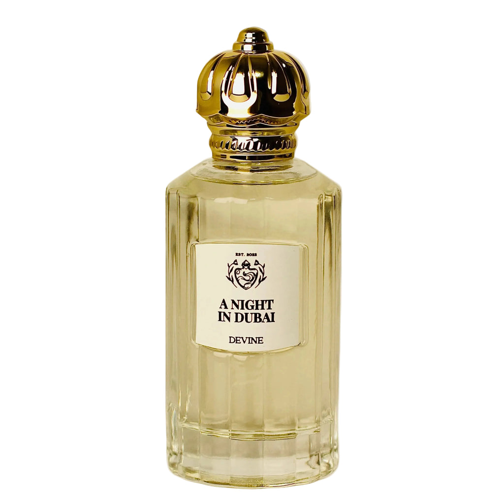Perfume bottle labeled 'A Night in Dubai' by Devine on a white background